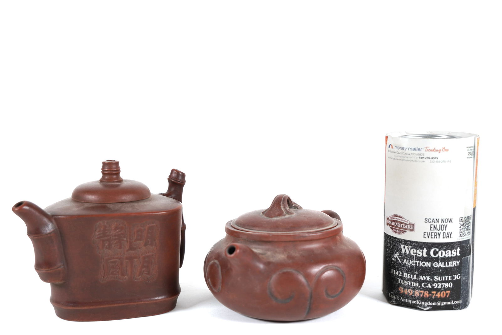 2 Chinese clay teapot: 2 Chinese fine clay teapot. Largest H: 4.5" x W: 6."