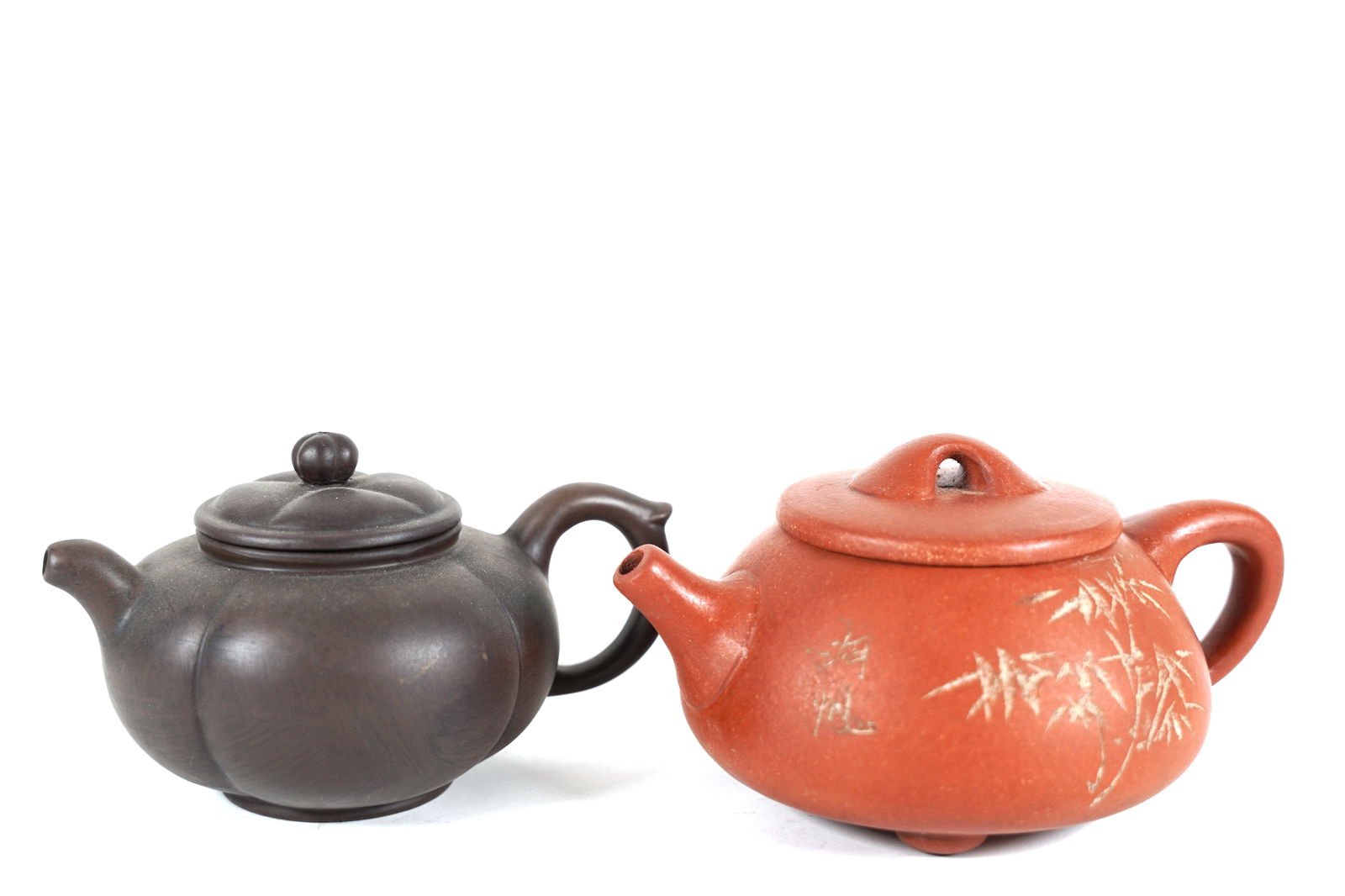 2 Chinese clay teapot: 2 Chinese fine clay teapot. H: 4" x W: 6.5."