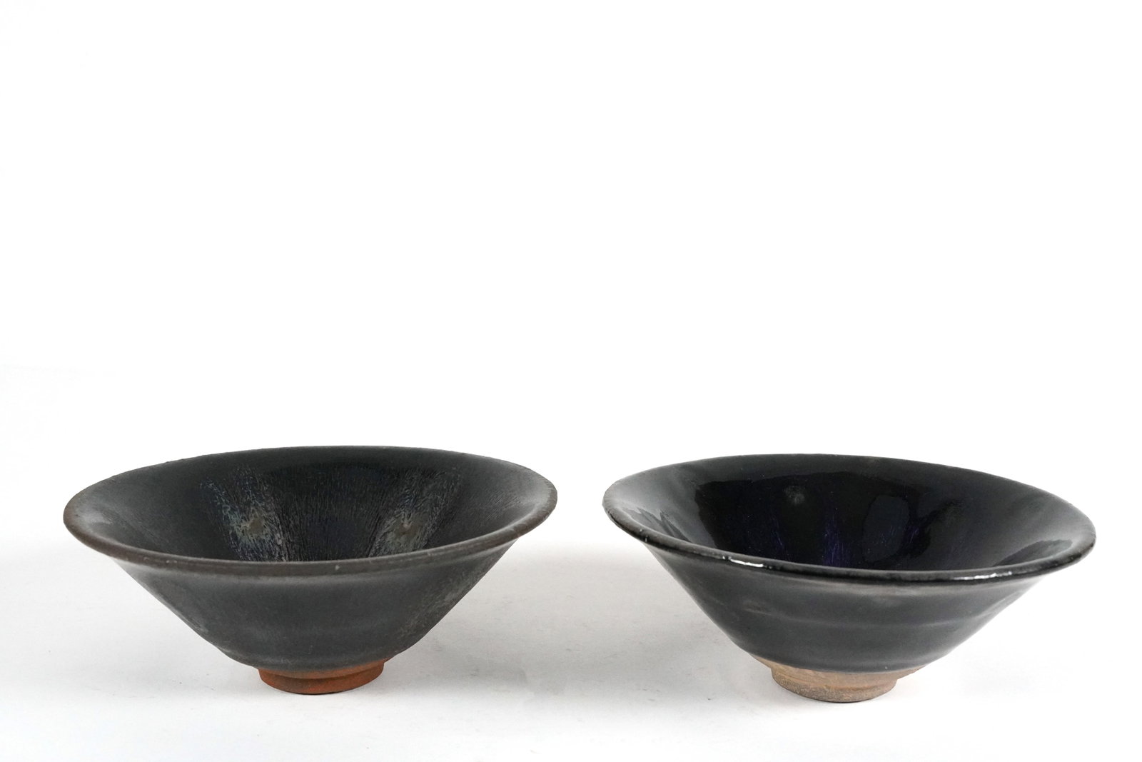 2 Chinese black bowls: 2 Chinese fine black glaze bowls. Largest H: 2.25" x W: 5.75."