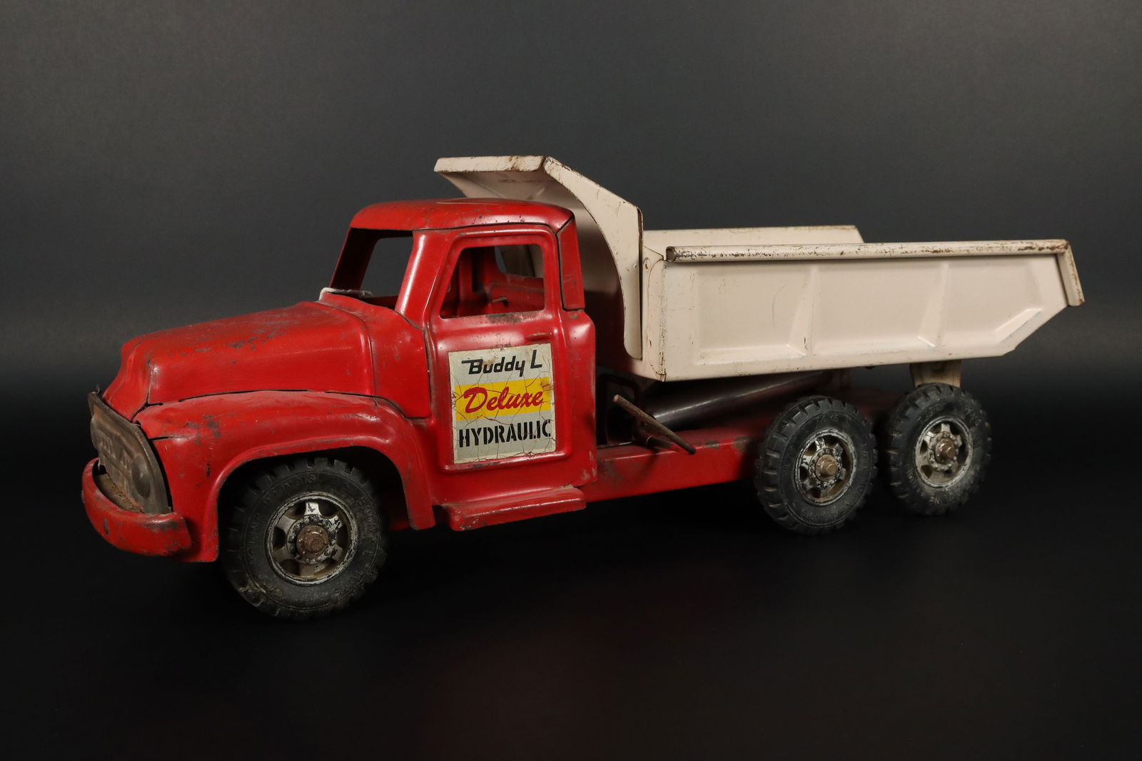 Buddy L dump truck: Buddy L original metallic dump truck. Condition selling it as is. Came from a major estate. H: 7.75" x W: 21.5."