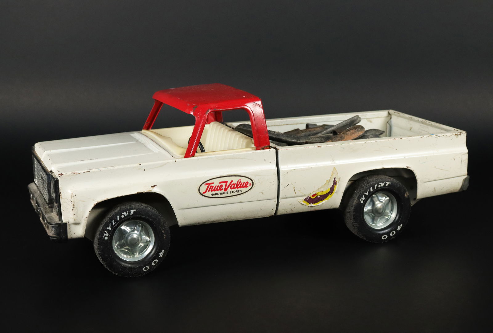 True Value metal truck: True Value metal Chevy truck. H: 5" x W: 13.25."