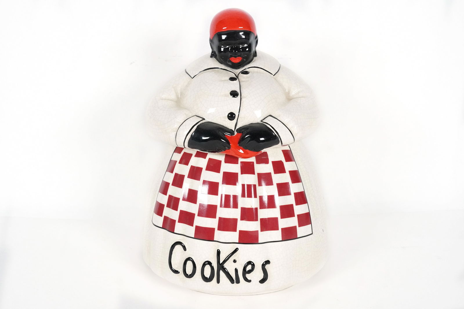 Black Americana jar: Black Americana cookie jar. H: 11" x W: 8."