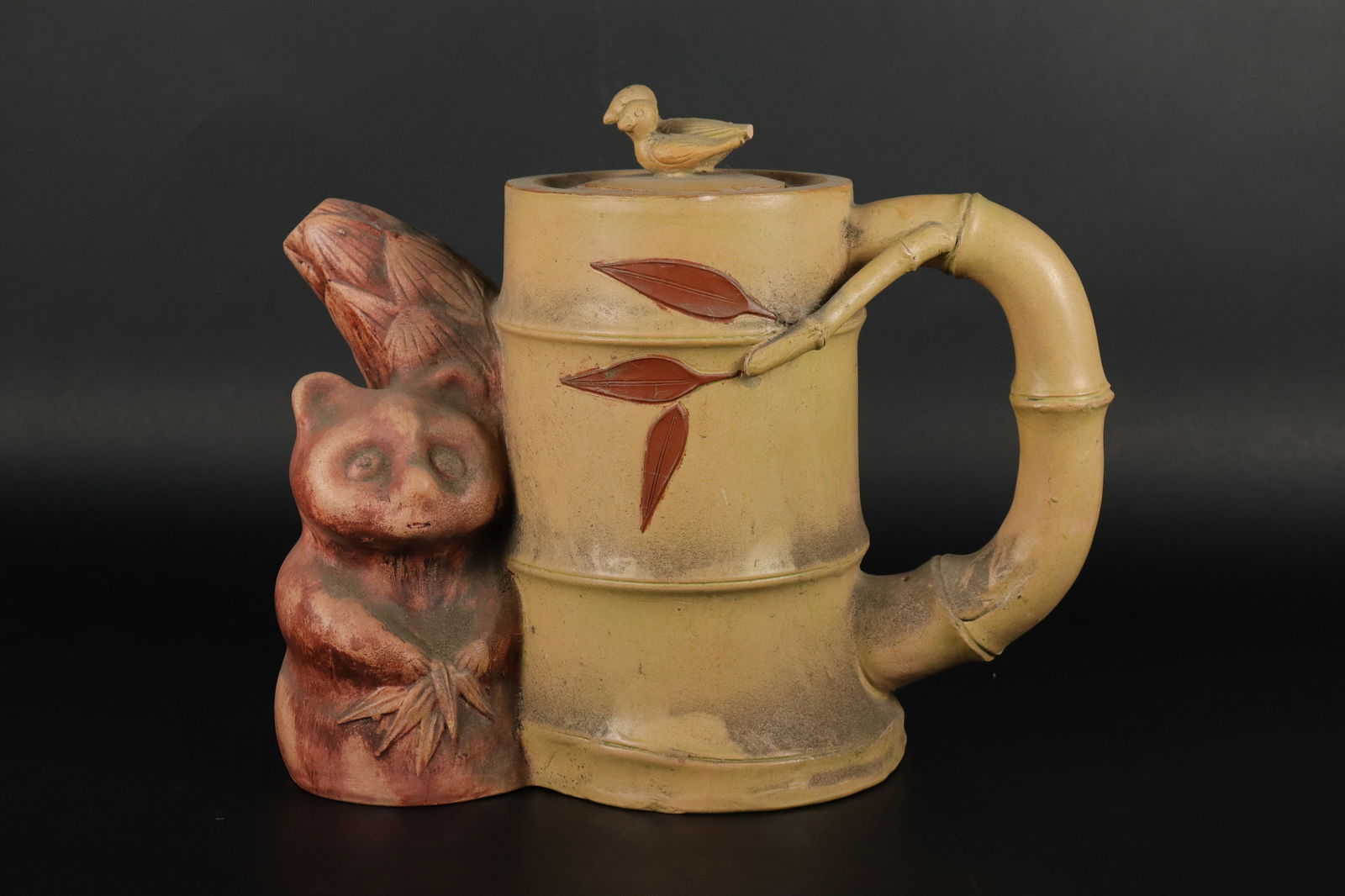 Chinese clay teapot: Chinese fine clay teapot. H: 9" x W: 10.25."