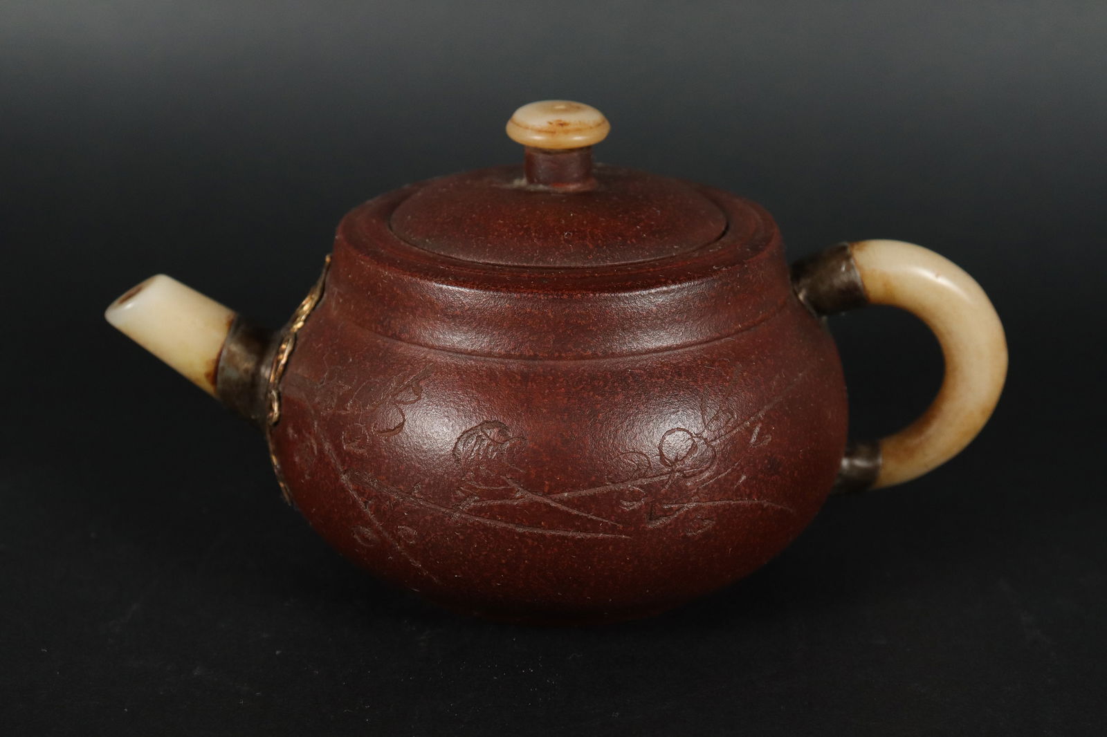 Chinese fine clay teapot: Chinese fine clay teapot, from an estate. H: 3.75" x W: 6.75."