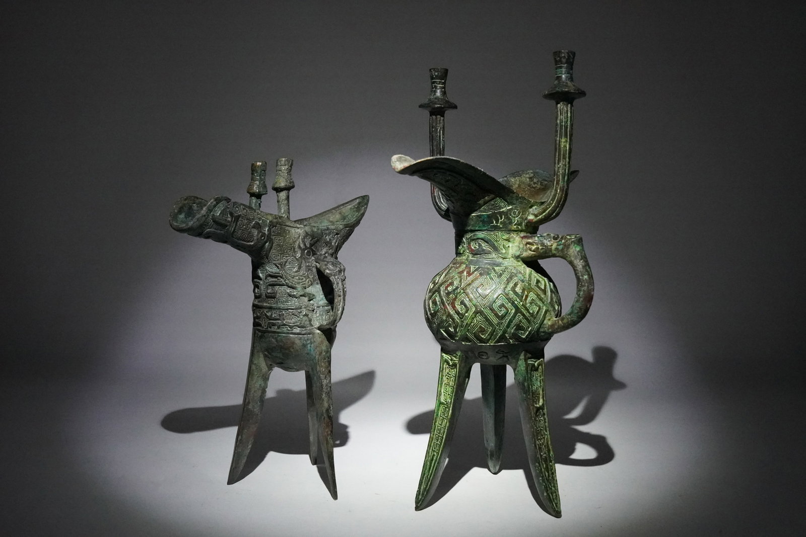 2 Chinese bronze wine cup: 2 Chinese fine bronze carved cup, in large size. European estate. Largest H: 10.5" x W: 7.5."