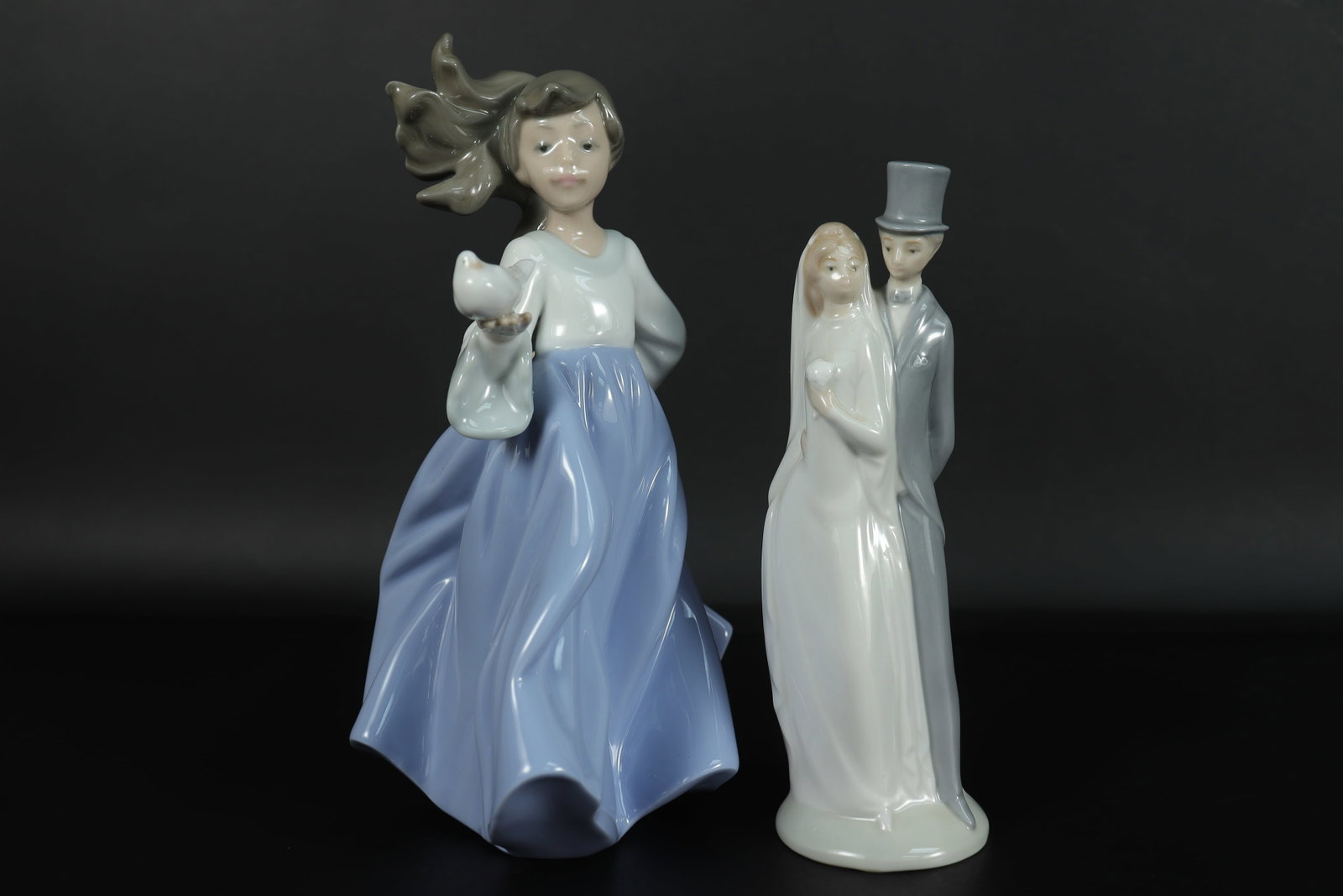 2 Lladro figurines: 2 Lladro figurines. Largest H: 7" x W: 5."