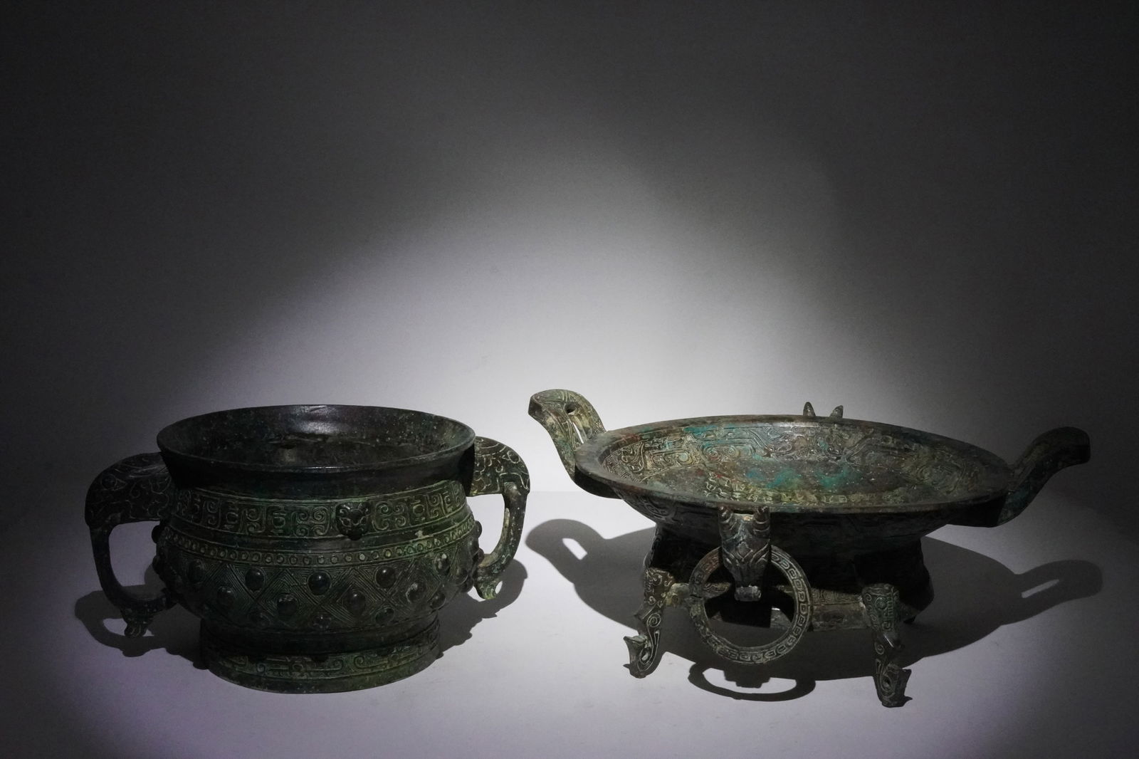 2 Chinese fine bronze vessels: 2 Chinese fine bronze vessels, some has carved inscriptions. Coler collection estate. Largest H: 5" x W: 11.25."
