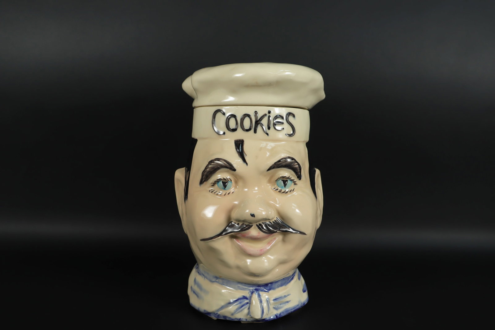 A vintage cookie jar: A vintage cookie jar. H: 10.5" x W: 6.5."