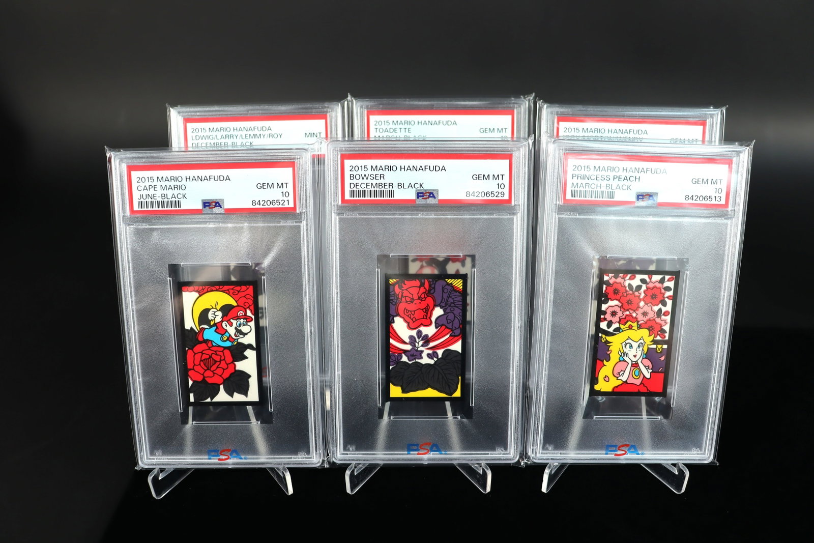 Lots Mario Hanafuda PSA card: Lots Mario Hanafuda graded PSA card. Graded 10 and 9.