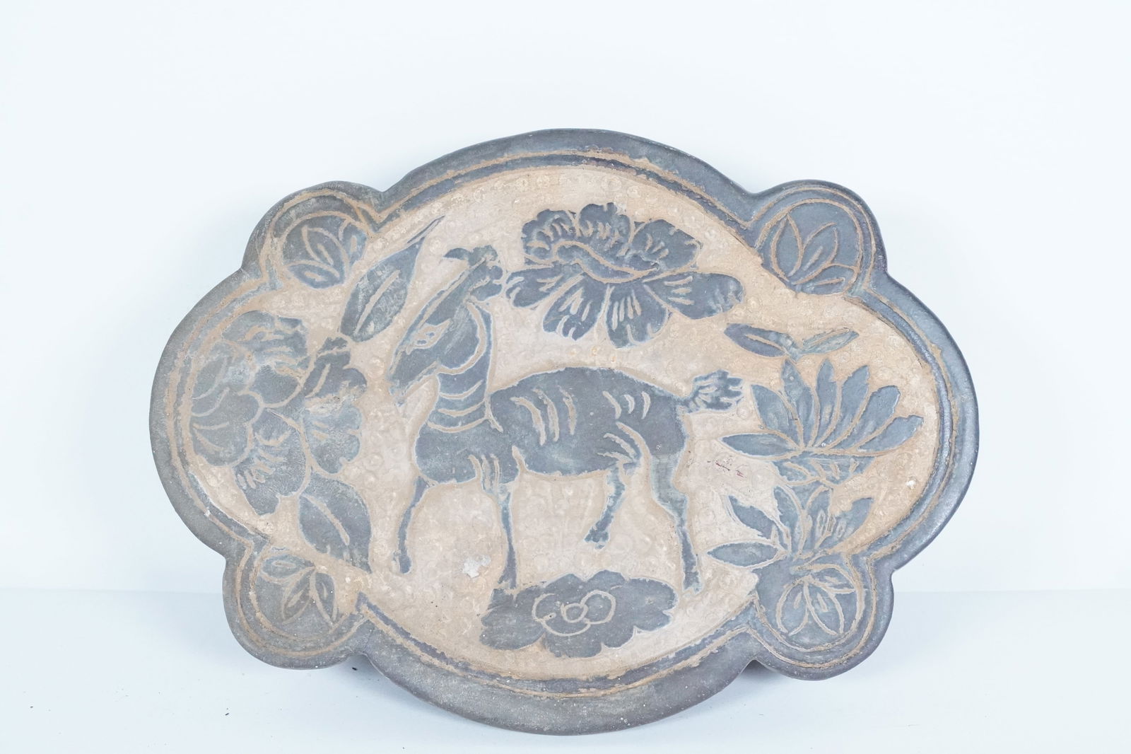 Chinese fine pottery pillow: Chinese fine pottery fine pillow. H: 2.5" x W: 9.8."