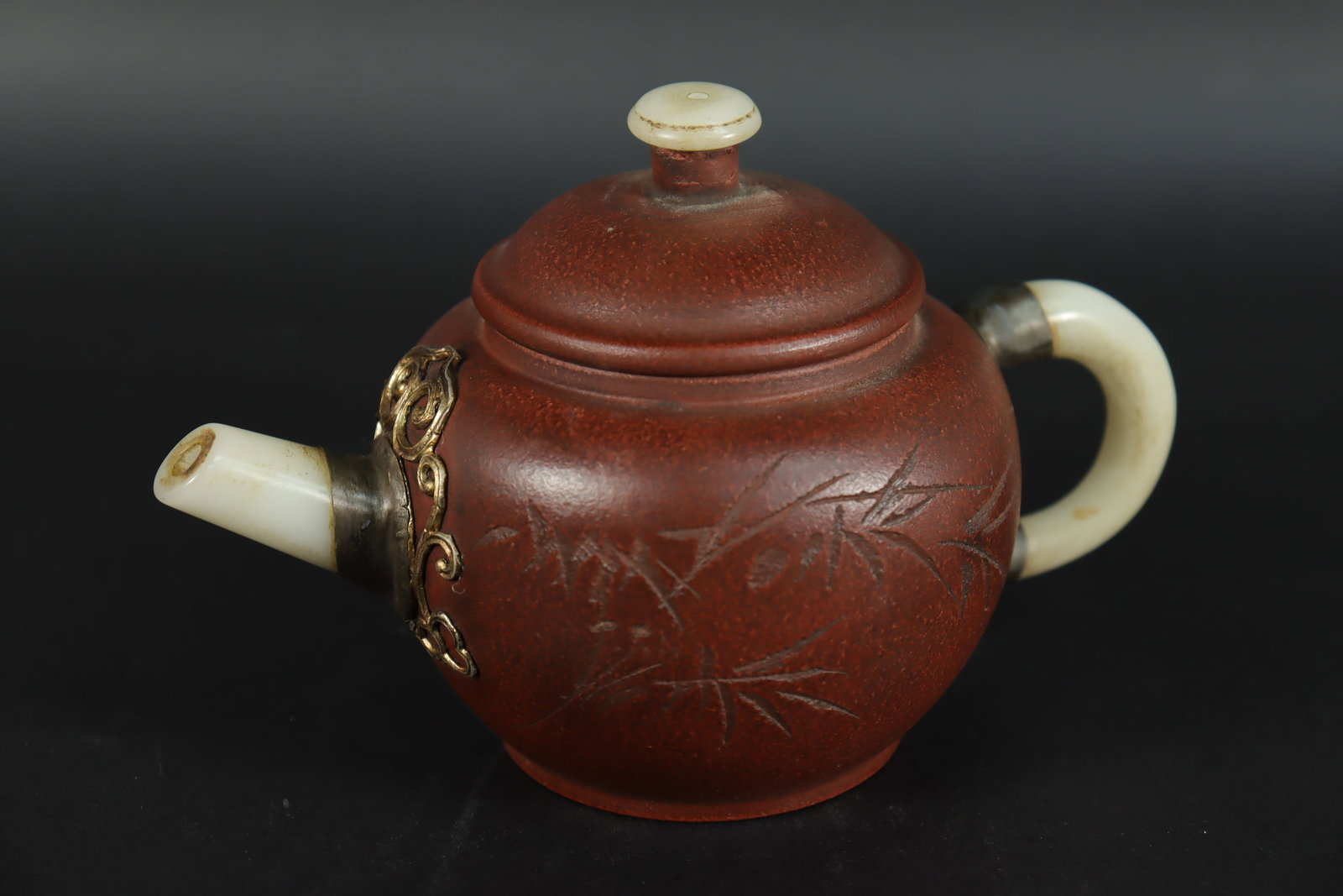 Chinese fine clay teapot: Chinese fine clay teapot. H: 3" x W: 6.5."