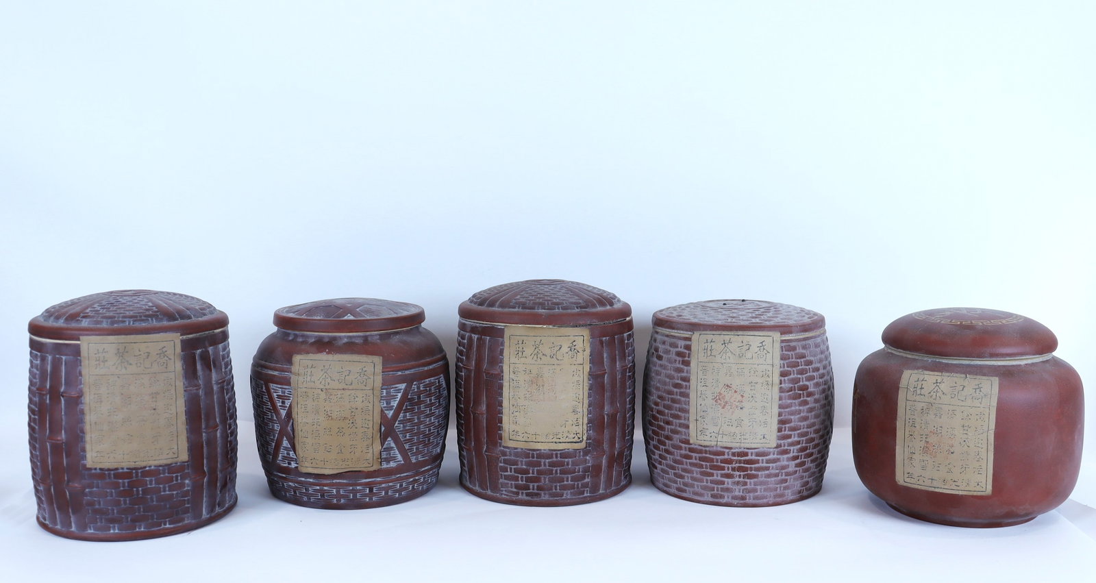 Lots Chinese tea caddies: Lots Chinese tea inside clay tea caddies.