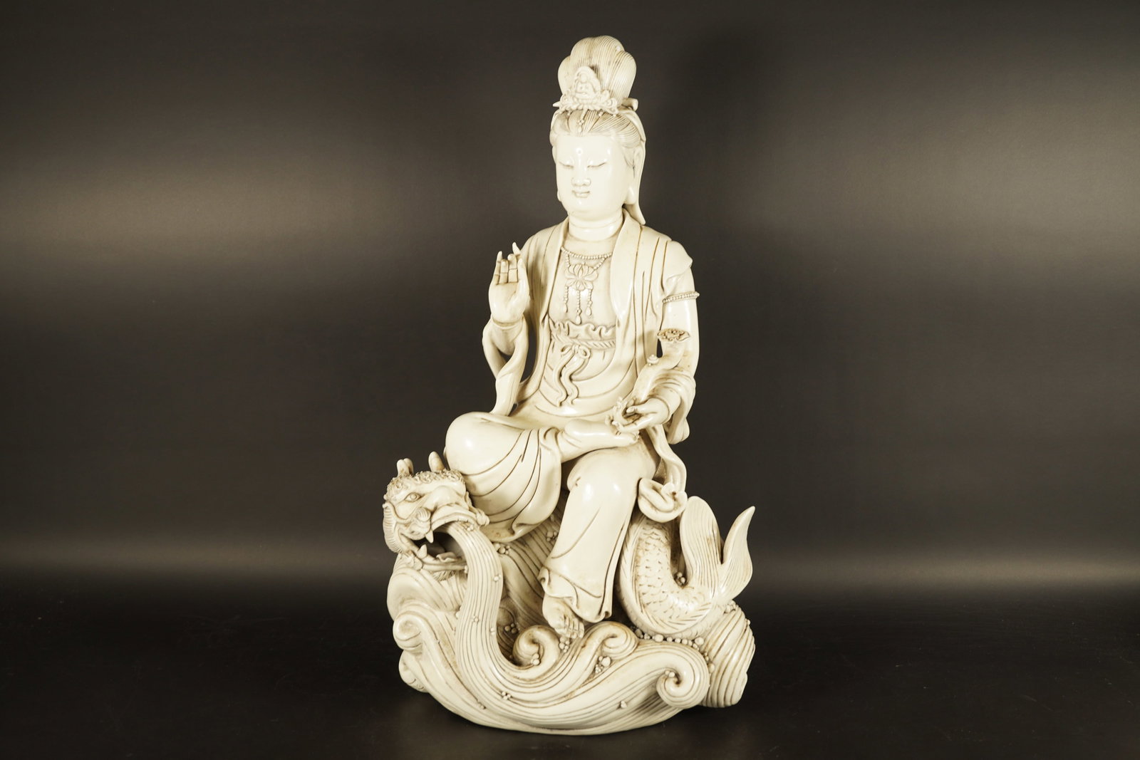 Chinese fine porcelain buddha: Chinese fine porcelain buddha. H: 21.5" x W: 1.8."