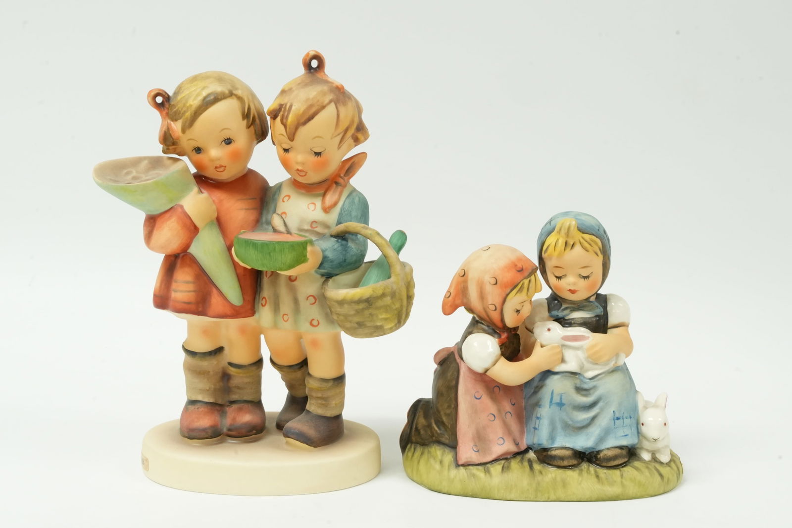 2 vintage Hummel figure: 2 vintage Hummel figures. Largest H: 7" x W: 4."