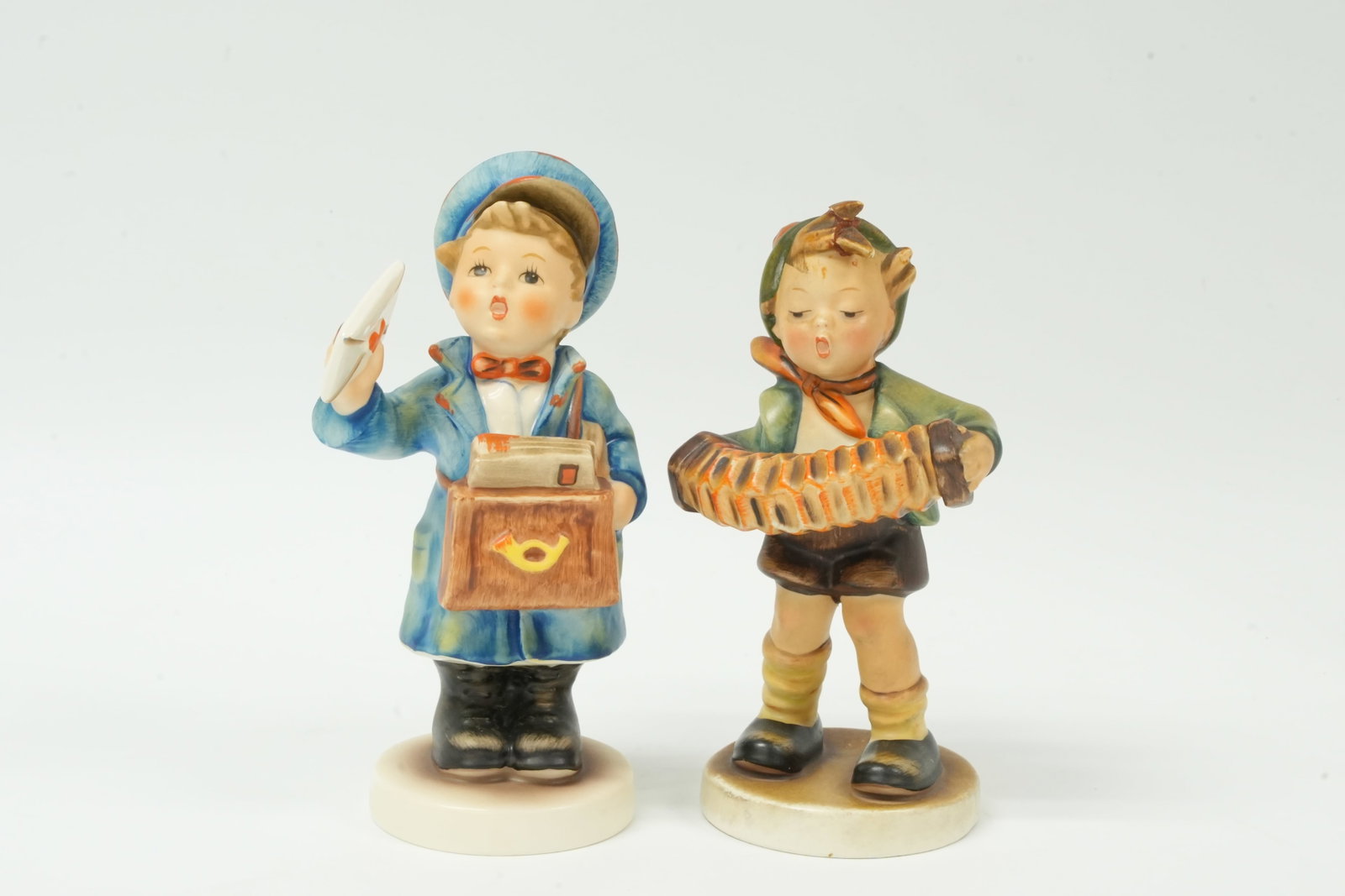 2 vintage Hummel figure: 2 vintage Hummel figures. Largest H: 6" x W: 2.5."