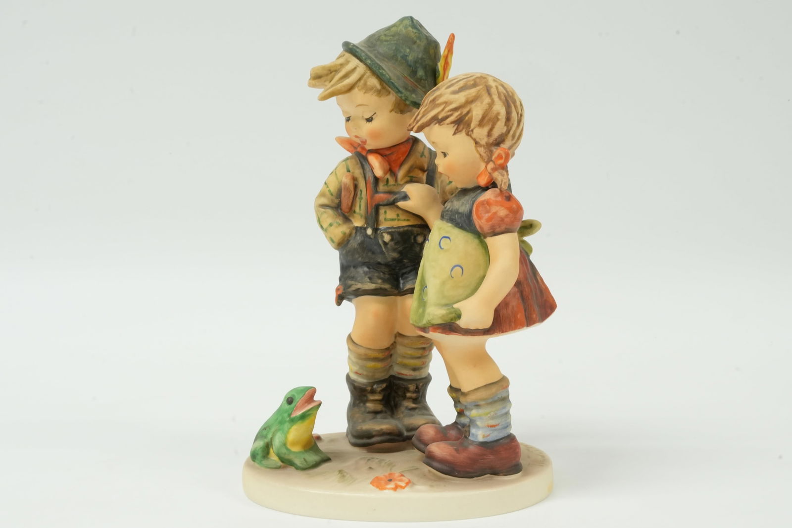 A vintage Hummel figurine: A vintage Hummel figurine. H: 8" x W: 4."
