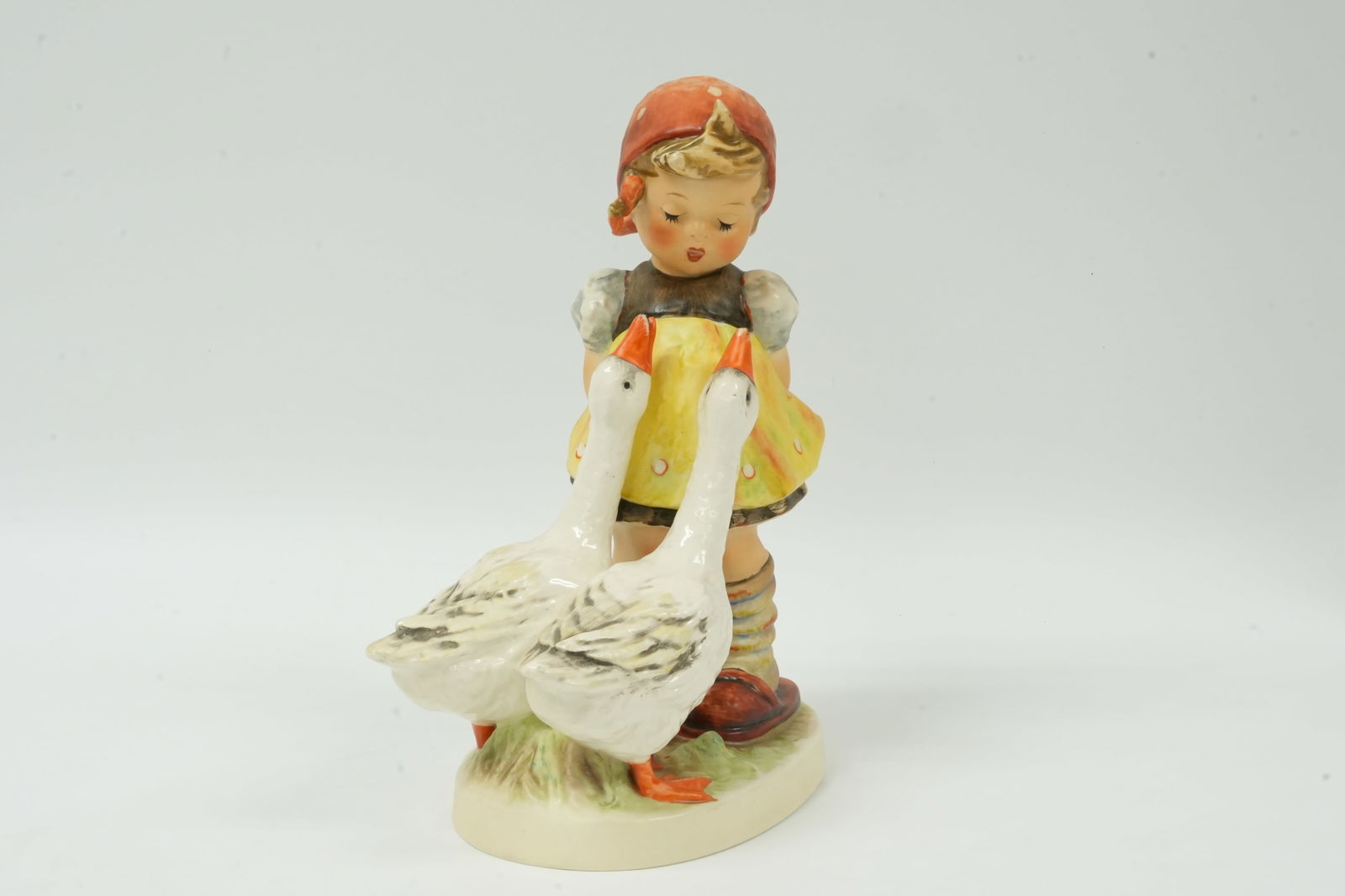 A vintage Hummel figurine: A vintage Hummel figurine. H: 8.5" x W: 5.5."