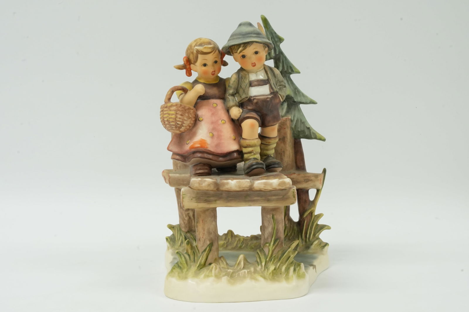 A vintage Hummel figurine: A vintage Hummel figurine. H: 9" x W: 5."