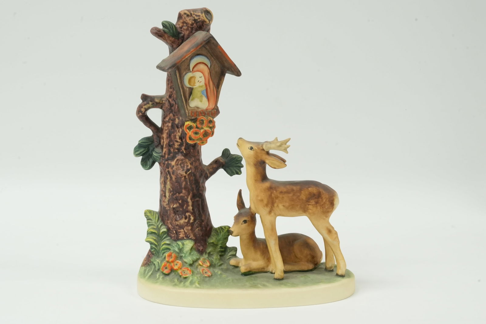 A vintage Hummel figurine: A vintage Hummel figurine. H: 9.5" x W: 7."