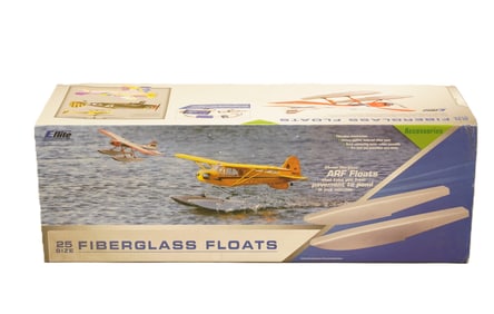 RC airplane float sets with original box. H: 29" x W: 10."