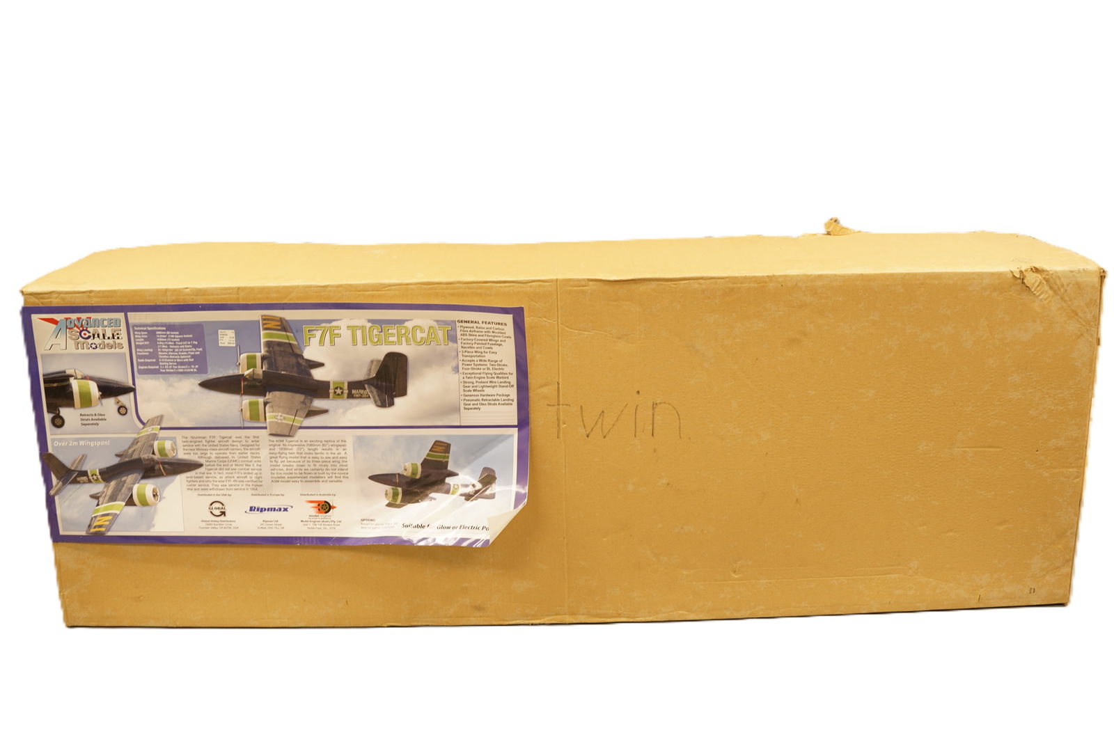 A large model RC airplane in box. H: 13.5" x W: 67." (1 of 8)