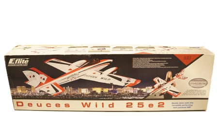 A large model RC airplane in box. Condition selling it as is. H: 8.5" x W: 54."