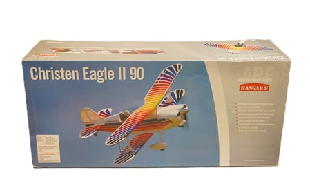 A large RC airplane in original box. H: 11.5" x W: 38."