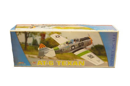 A large RC airplane in original box. H: 10" x W: 4.2."