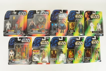 Lots Star Wars action figures in original box.