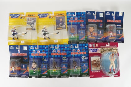 Lots sport action figures in original packaging.