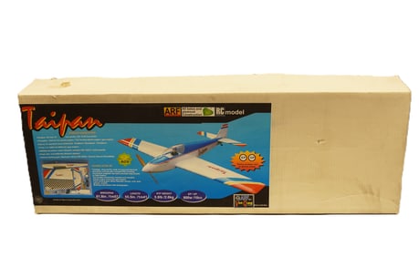 A large RC airplane in original box. Taipan, condition selling it as is.
