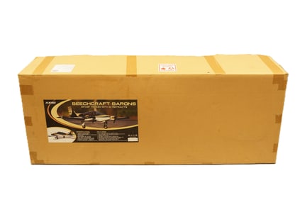 A large RC airplane in original box. Beechcraft Barons, condition selling it as is.