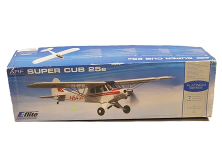 A large RC airplane in original box. Super Cub 25e, condition selling it as is.