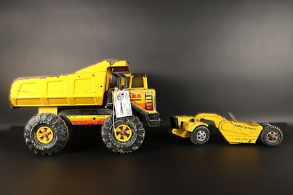 Lots vintage metal toy. Largest H: 10" x W: 17.5."