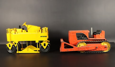 Lots vintage metal toy. Largest H: 8" x W: 11."