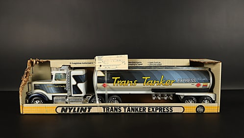 A vintage truck figure/ H: 6.8" x W: 29.6."