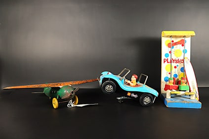 Lots vintage toy figures. Largest H: 4.5" x W: 18."