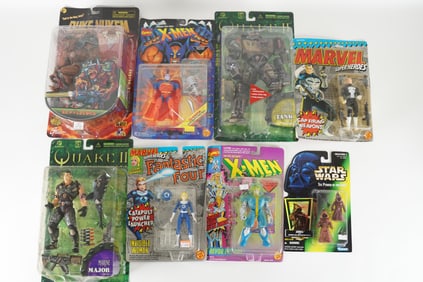 Lots vintage action figures. Largest H: 13" x W: 10."
