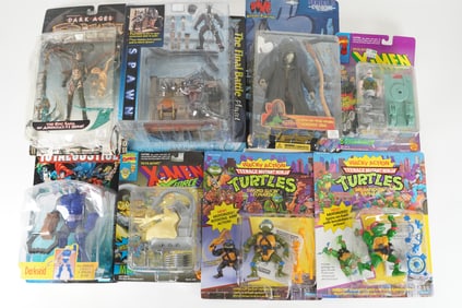 Lots vintage action figure in original box. Largest H: 11" x W: 9."
