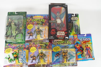 Lots vintage action figures in original box. Largest H: 11.25" x W: 9."