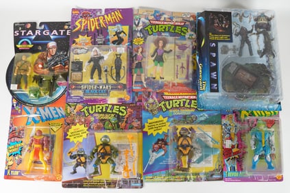 Lots vintage action figures in original box. Largest H: 12" x W: 10."