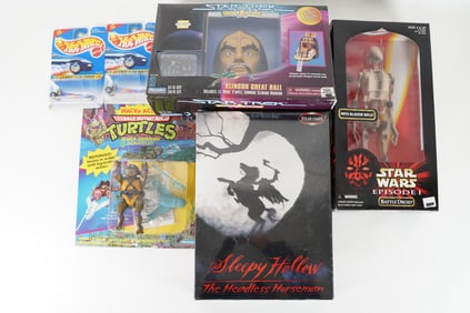 Lots vintage action figures in original box. Largest H: 12.5" x W: 3."
