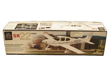 A large RC airplane, SR 22 Turbo, in original box. Condition selling it as is.