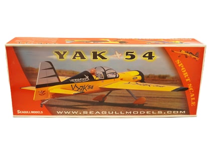 A large RC airplane, Yak 54 in orignial box. Condition selling it as is.