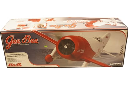 A large RC airplane, Gee Bee in original box. Condition selling it as is.