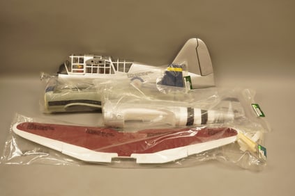 A vintage RC airplane, condition selling it as is. H: 51" x W: 10."