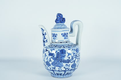 Chinese fine blue and white pot. H: 9.5" x W: 6.5."