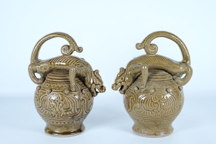 2 Chinese fine pottery. H: 9" x W: 7."