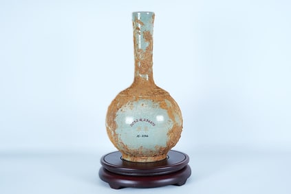 Chinese fine celadon vase. H: 11.5" x W: 6." From an estate.