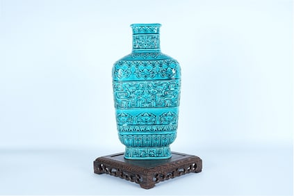 Important fine Chinese carved vase with turquoise glaze. From a major estate. H: 11.8" x W: 5.5."